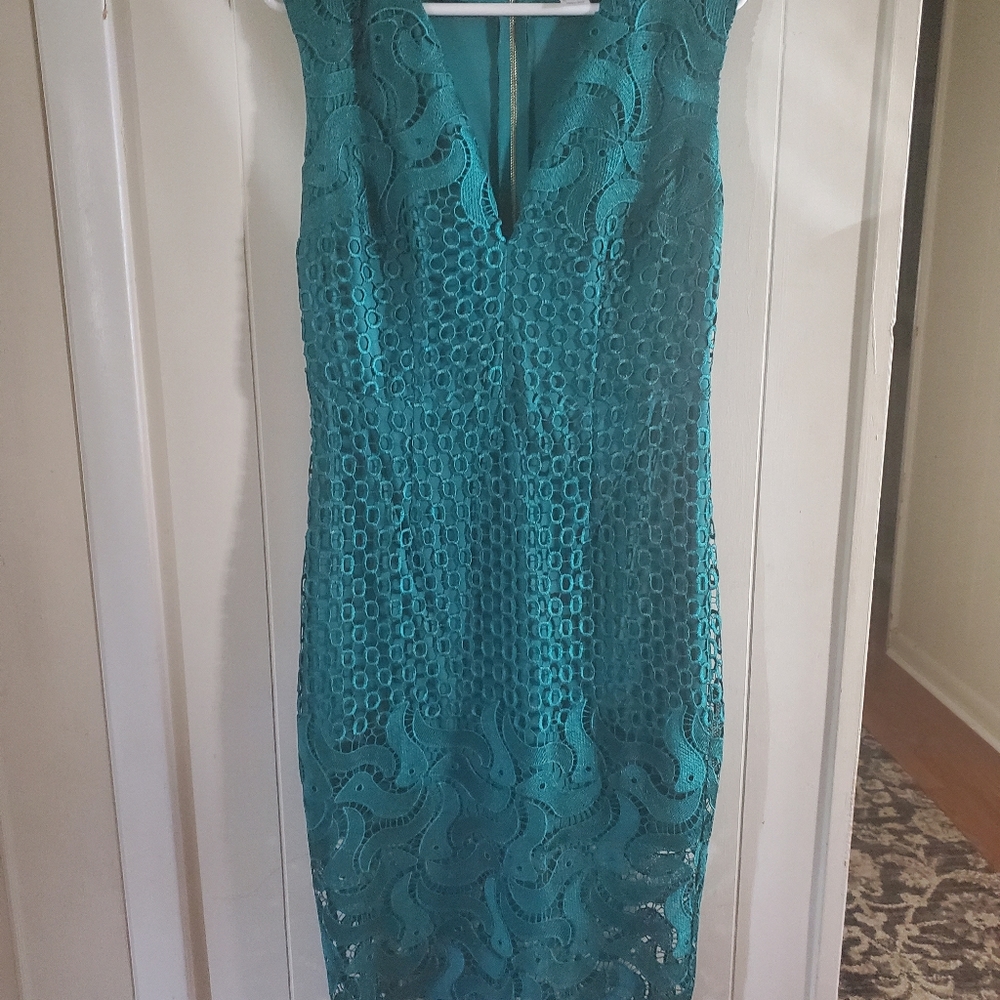 Deep plunge v neck emerald color venus dress